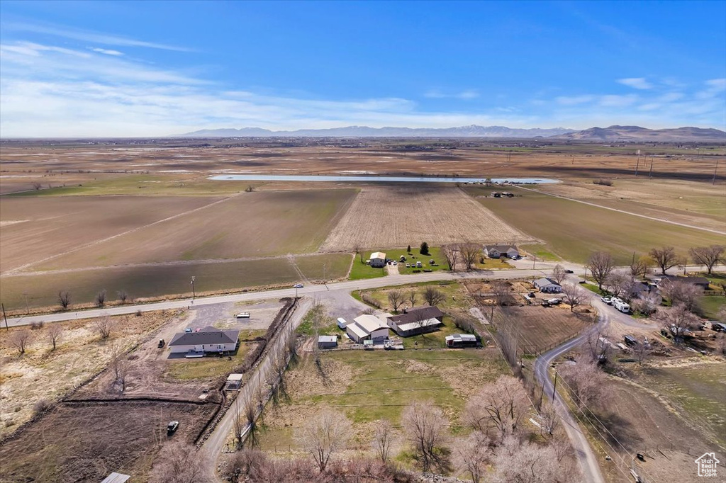 Drone / aerial view with a mountain view and a rural view
