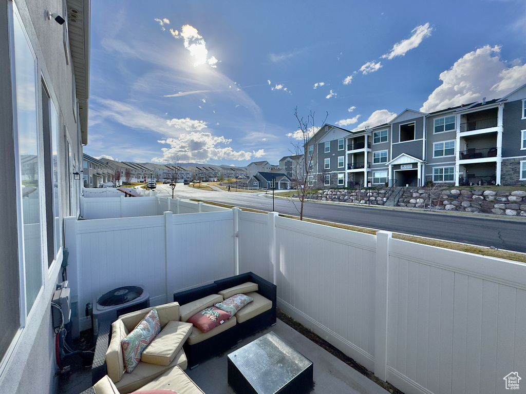 Balcony featuring a residential view