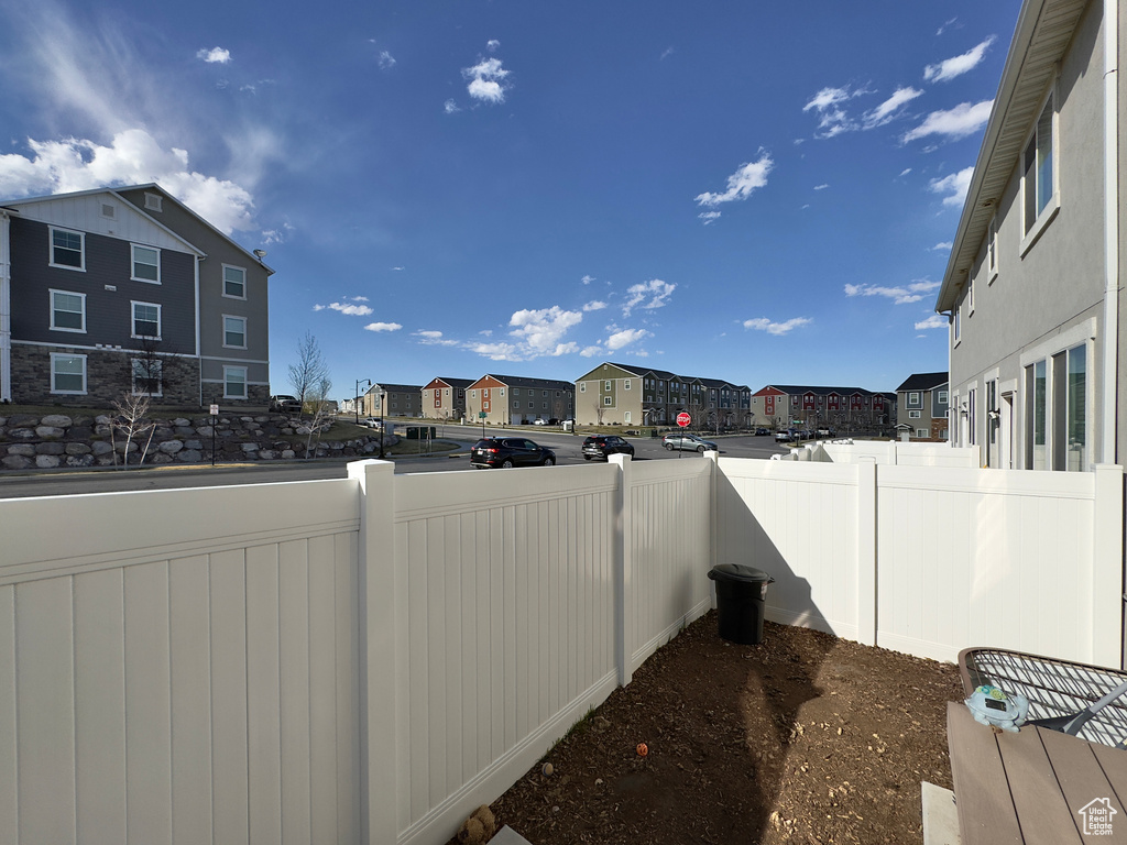 Exterior space featuring a fenced backyard