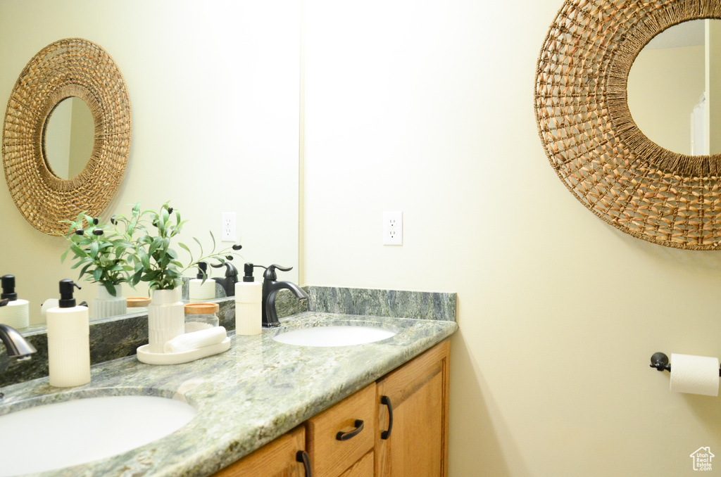 Bathroom with double vanity and a sink