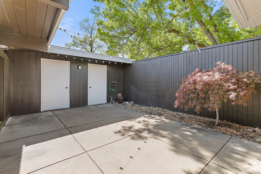 View of patio / terrace featuring fence