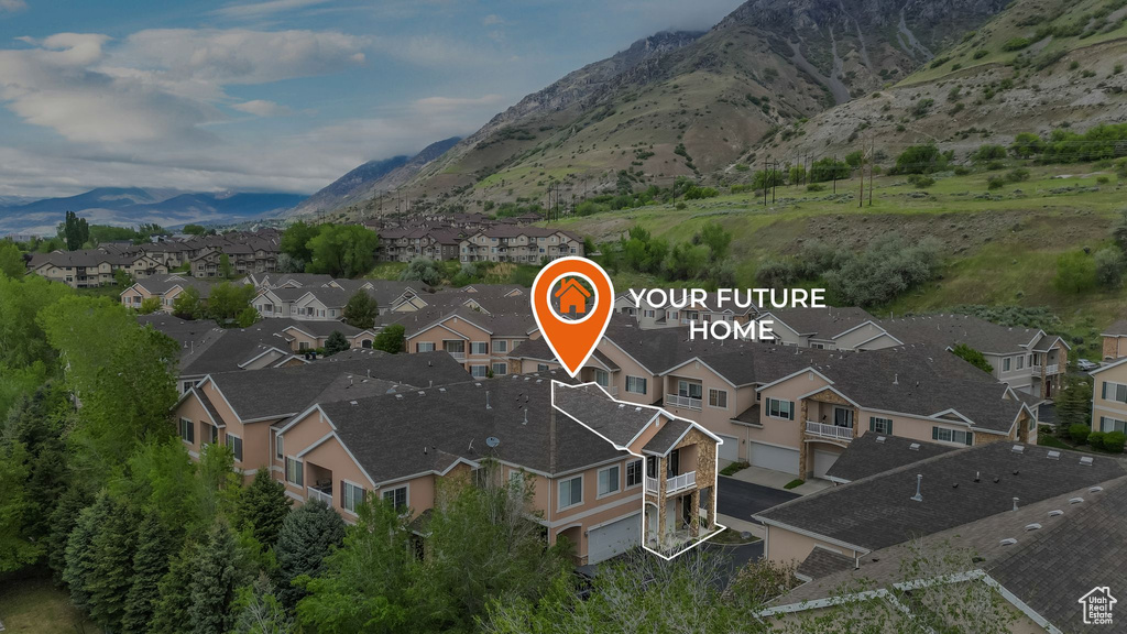 View of property location with nearby suburban area and a mountainous background