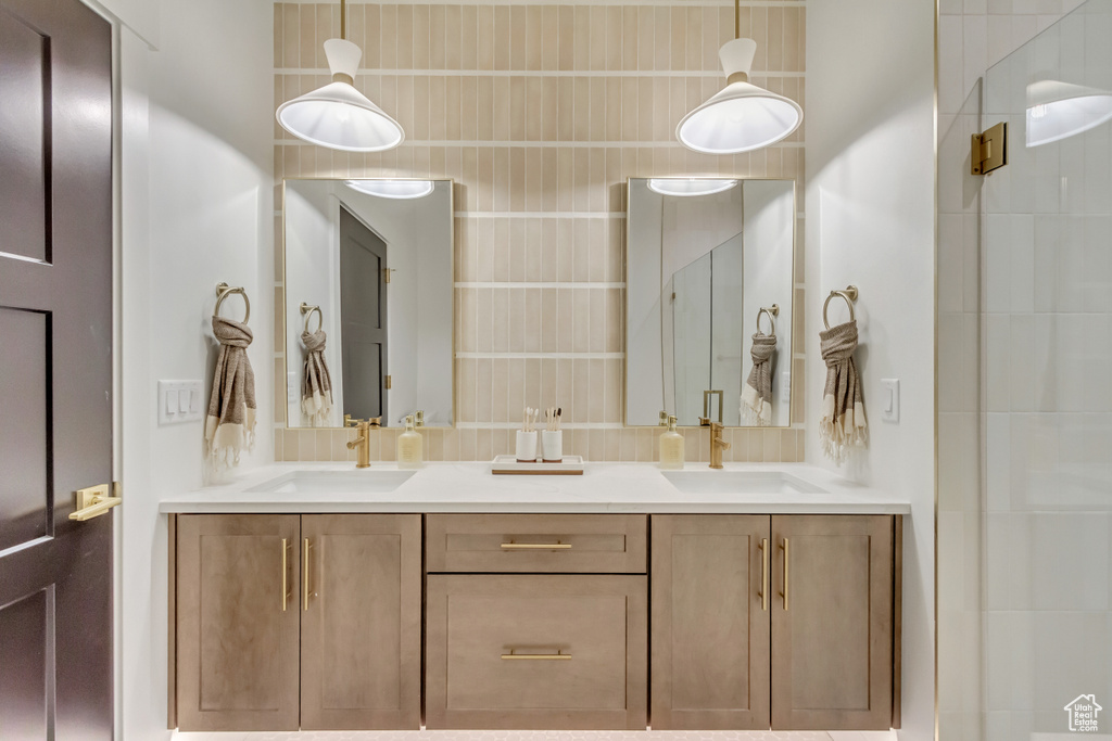 Bathroom with double vanity and a sink