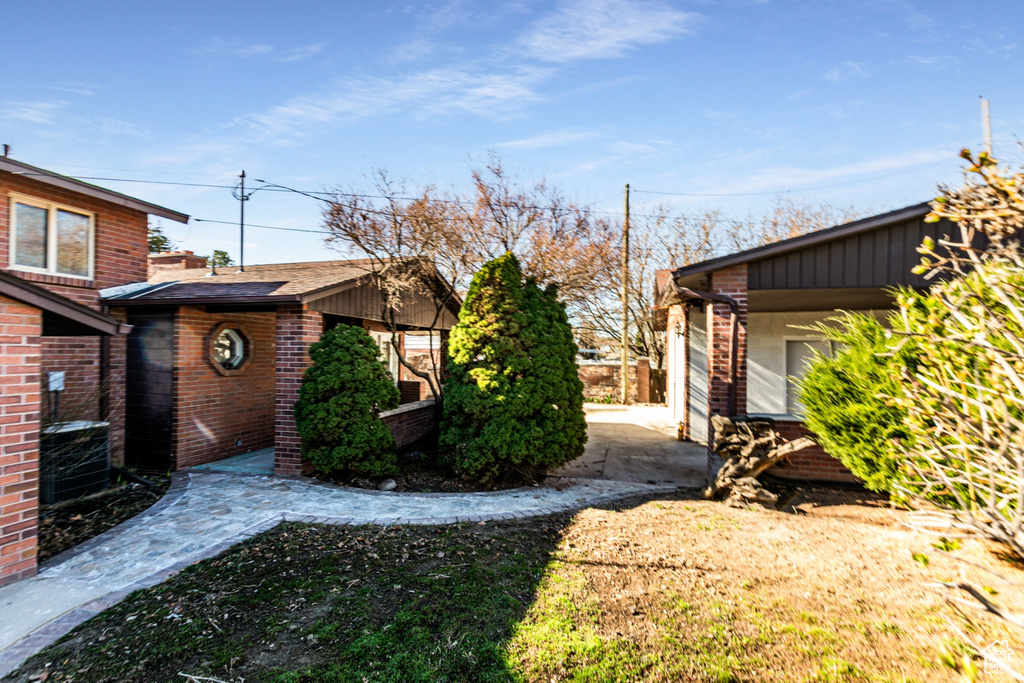 View of yard featuring central AC