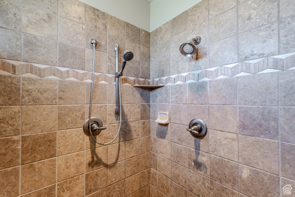 Bathroom with tiled shower