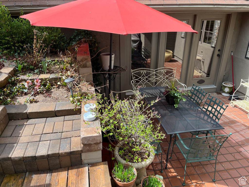 View of patio with outdoor dining space