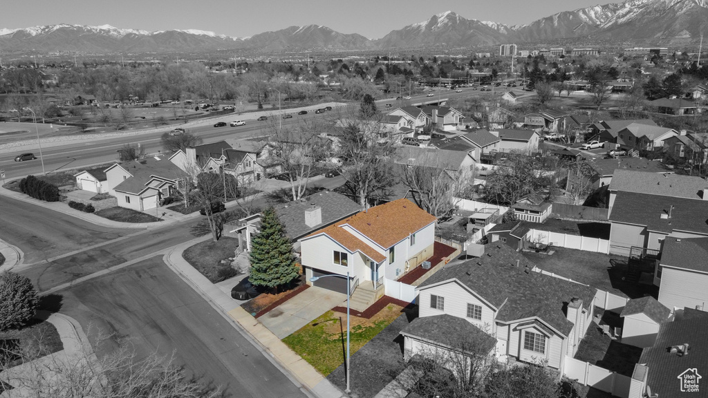 Birds eye view of property featuring a residential view and a mountain view