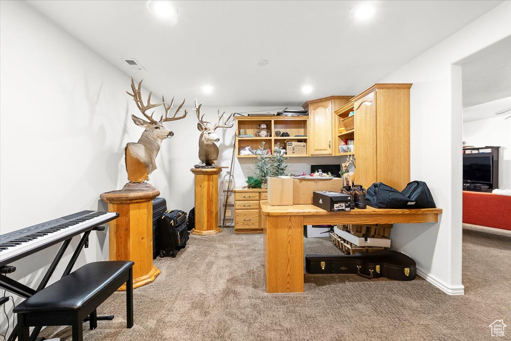 Office space with baseboards, light colored carpet, and recessed lighting