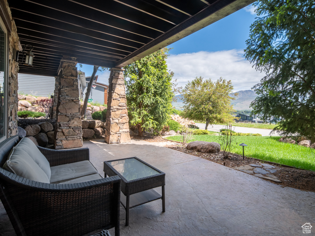 View of patio with a mountain view