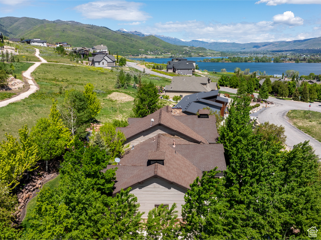 View from above of property featuring a water and mountain view