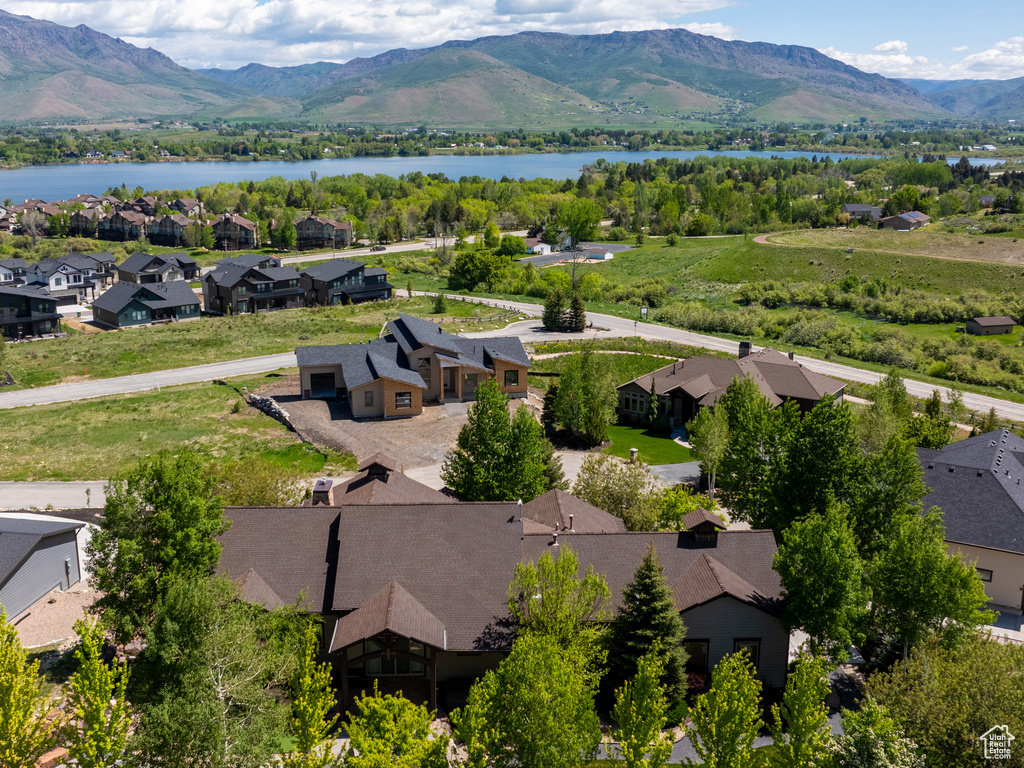 Aerial view of residential area with a water and mountain view