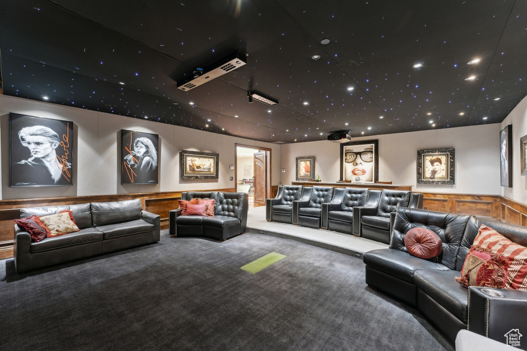 Home theater room featuring carpet floors