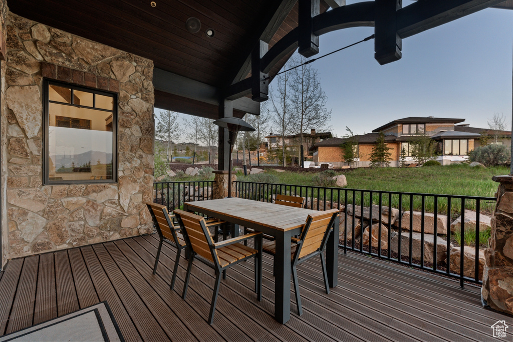 Wooden deck with outdoor dining space