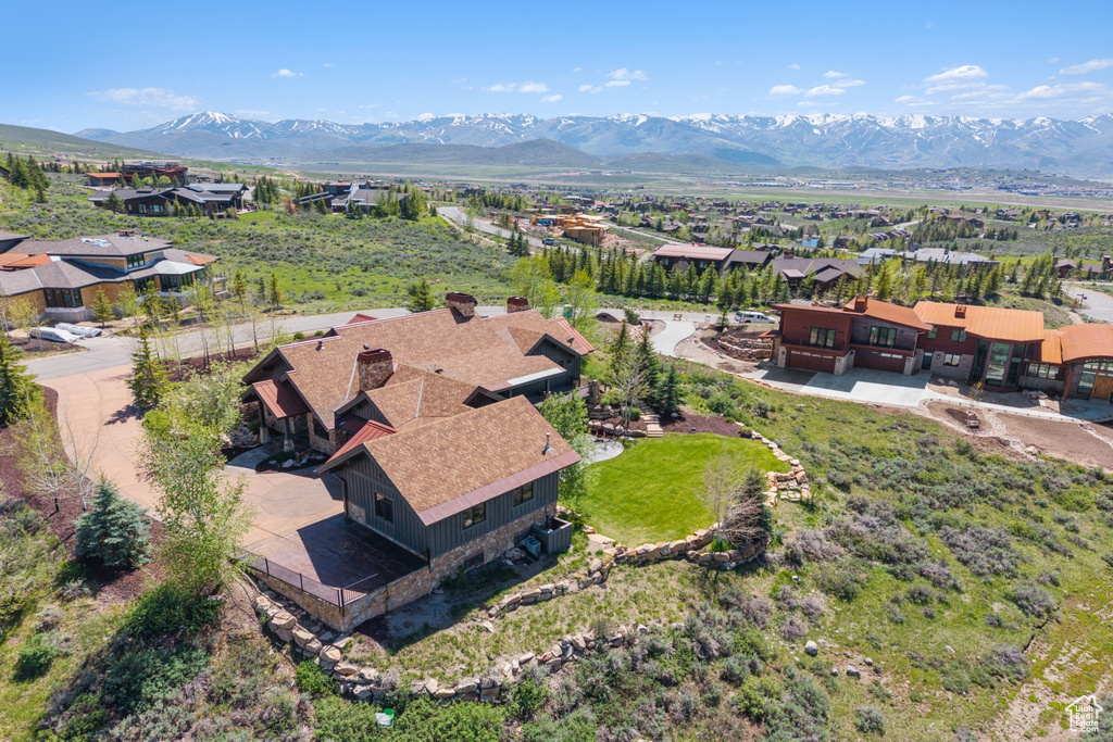 Aerial perspective of suburban area with mountains
