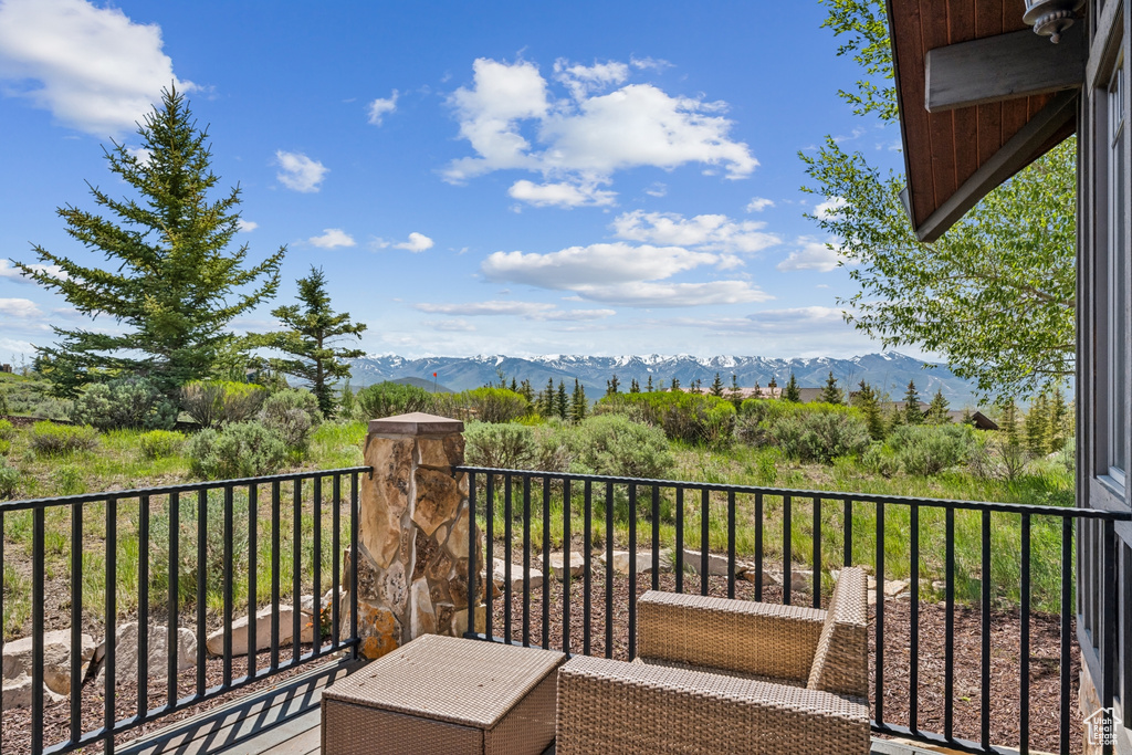 Balcony featuring a mountain view