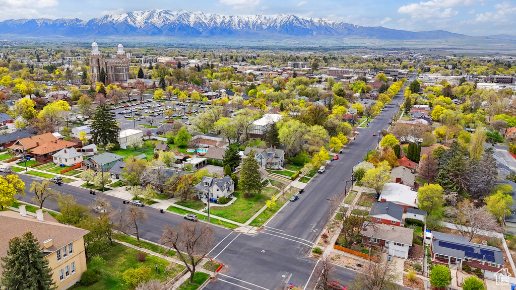 Drone / aerial view with a mountain view and a residential view