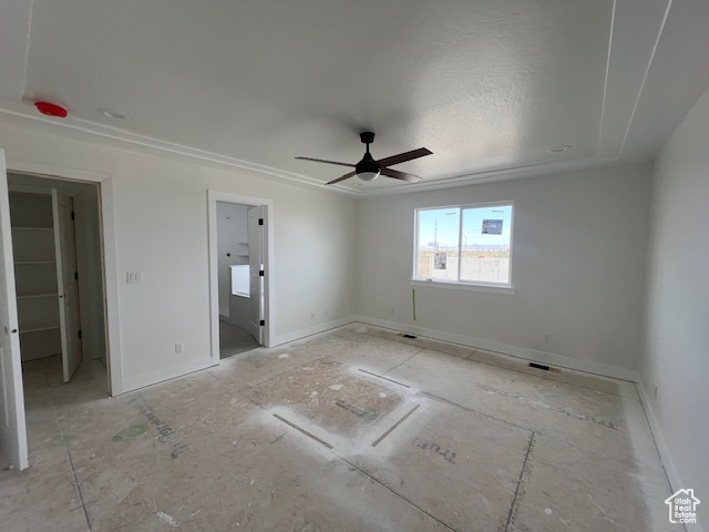 Unfurnished bedroom with baseboards and ceiling fan