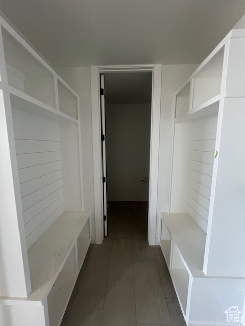 Mudroom with tile patterned floors
