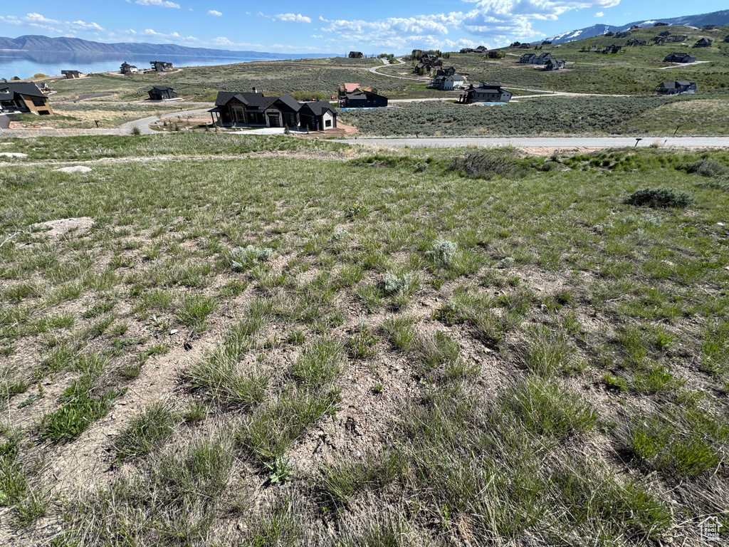 View of mountain background with a nearby body of water