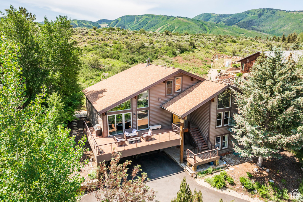 View from above of property featuring a mountain backdrop