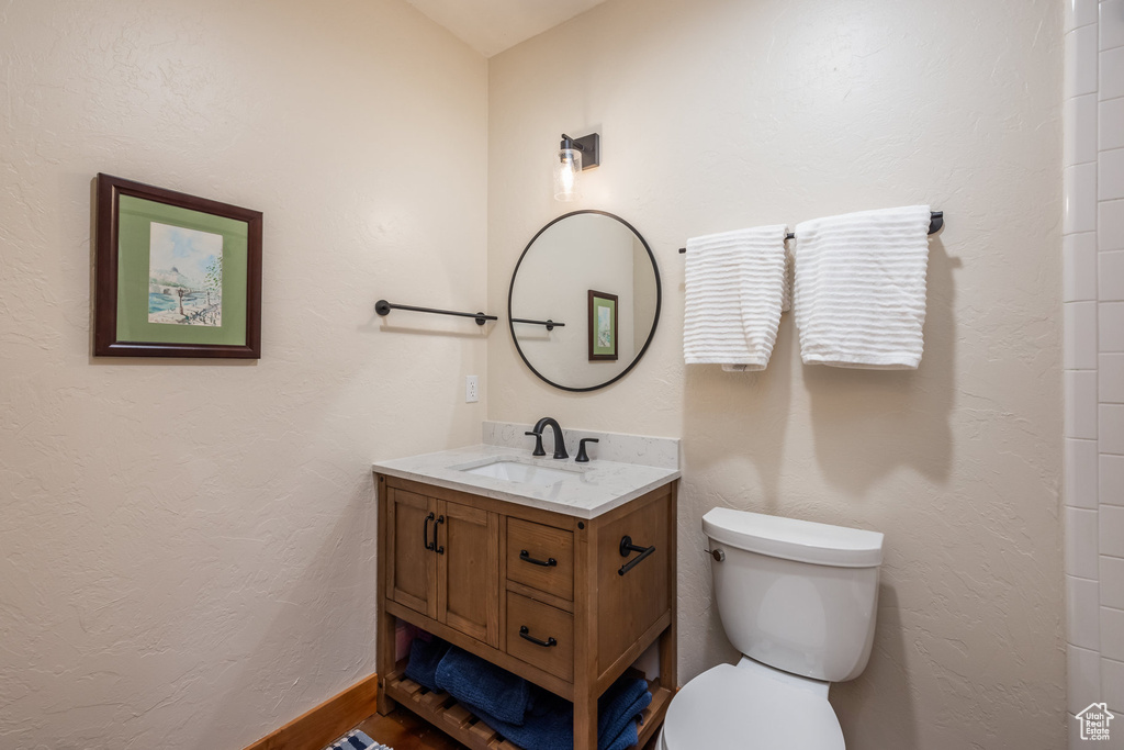 Bathroom with vanity and toilet