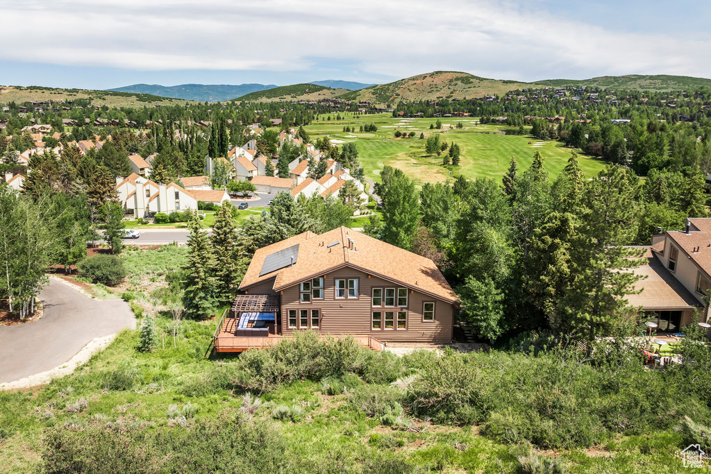View of subject property with a mountainous background