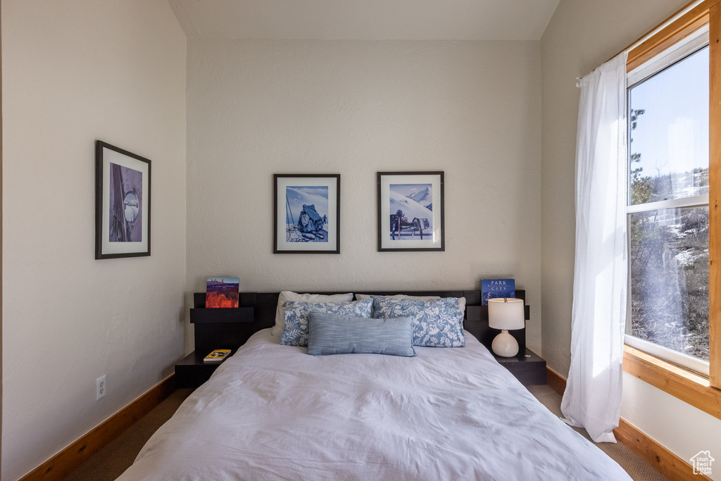 Bedroom featuring baseboards