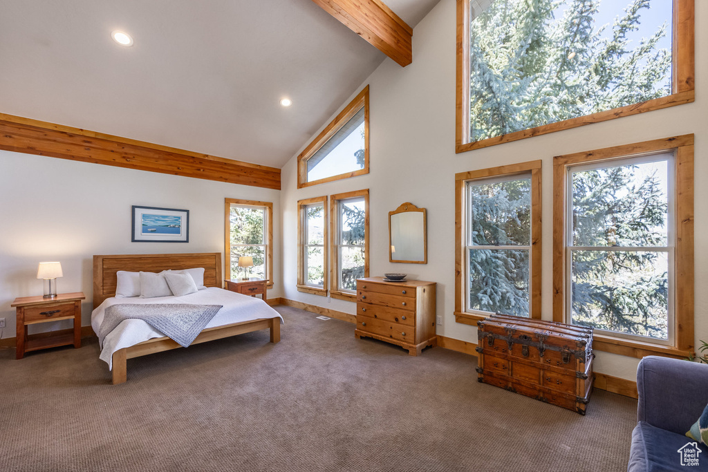 Bedroom featuring carpet floors, beamed ceiling, baseboards, high vaulted ceiling, and recessed lighting