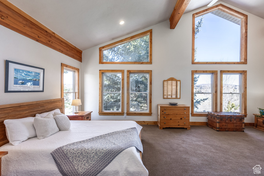 Carpeted bedroom featuring high vaulted ceiling, baseboards, beamed ceiling, and recessed lighting