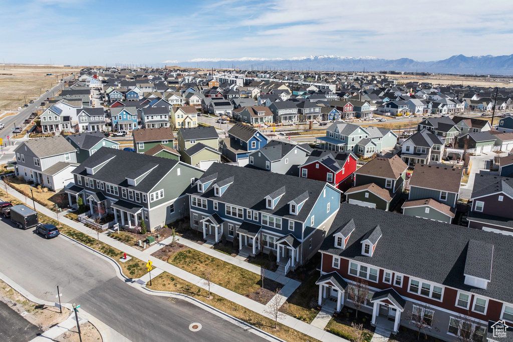 Drone / aerial view featuring a residential view and a mountain view