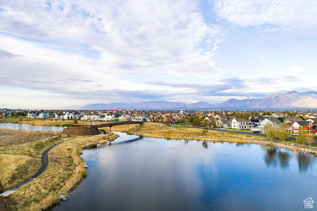 Property view of water featuring a residential view and a mountain view