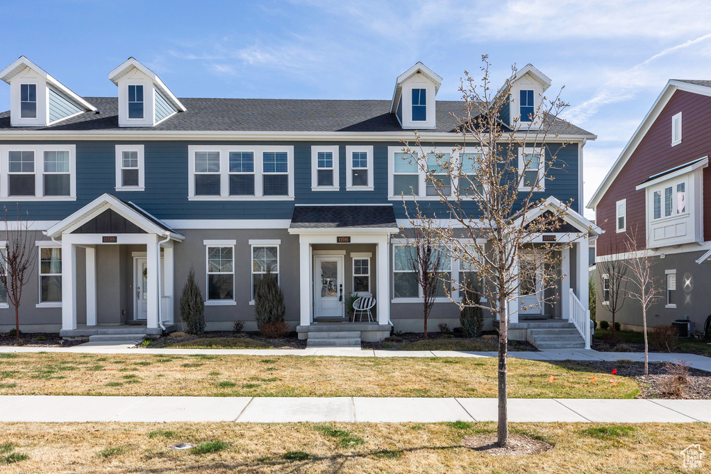 View of front of house with a front lawn