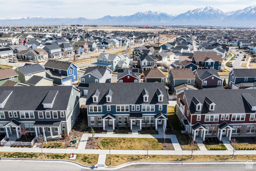 Drone / aerial view featuring a residential view and a mountain view