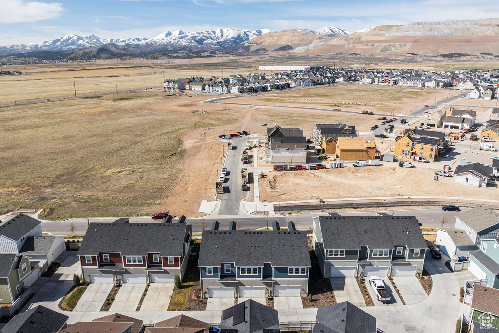 Birds eye view of property with a residential view and a mountain view