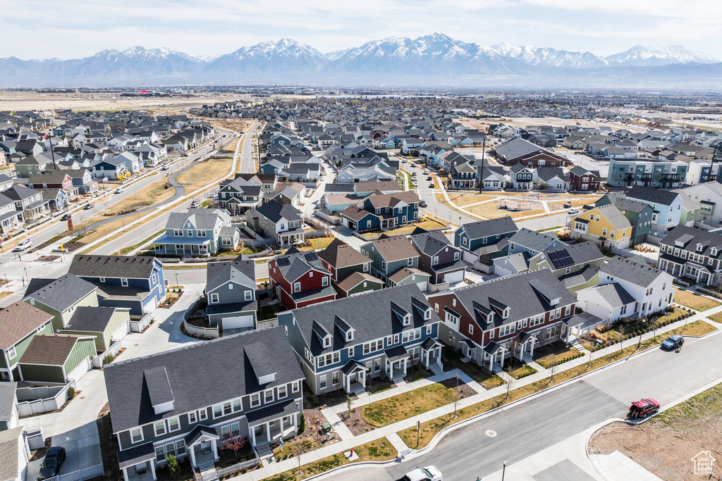 Drone / aerial view featuring a mountain view and a residential view