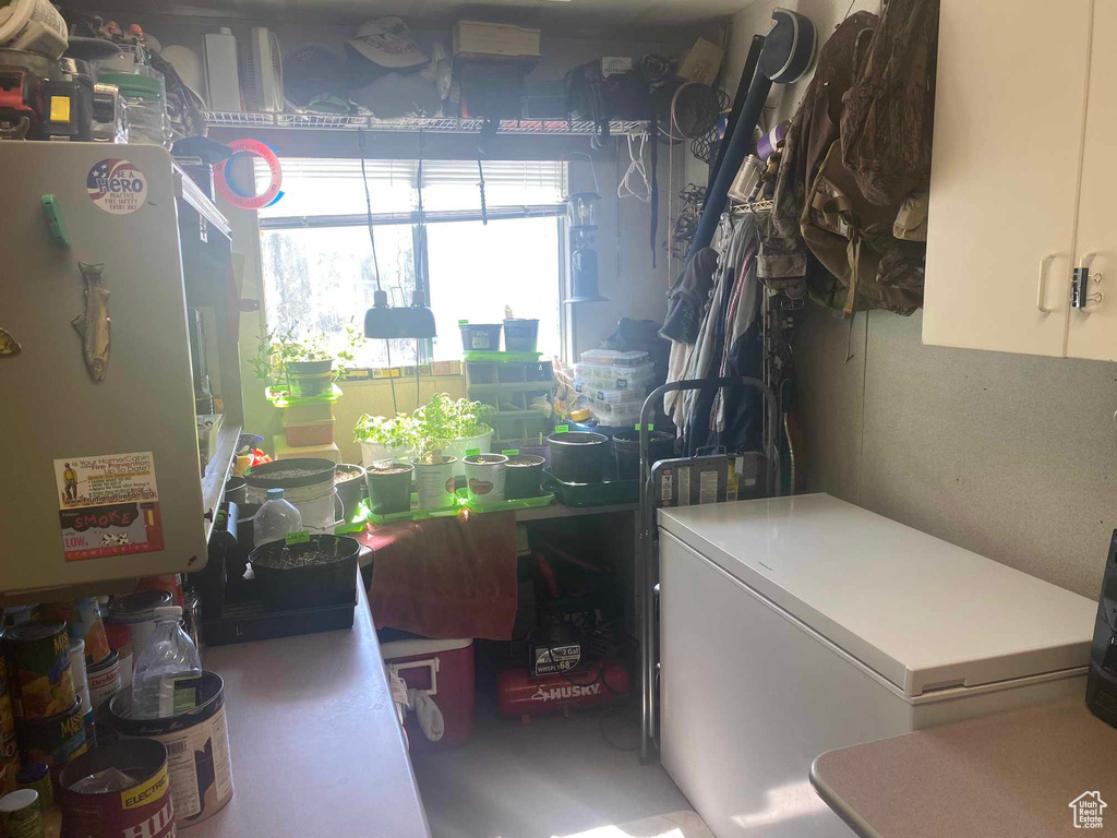 Clothes washing area featuring laundry area