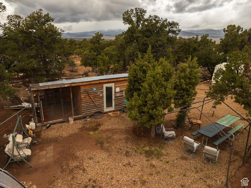 Rear view of house with fence