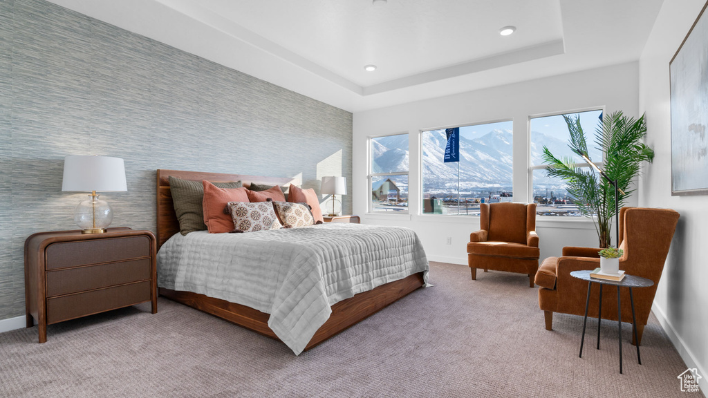 Carpeted bedroom with baseboards and recessed lighting