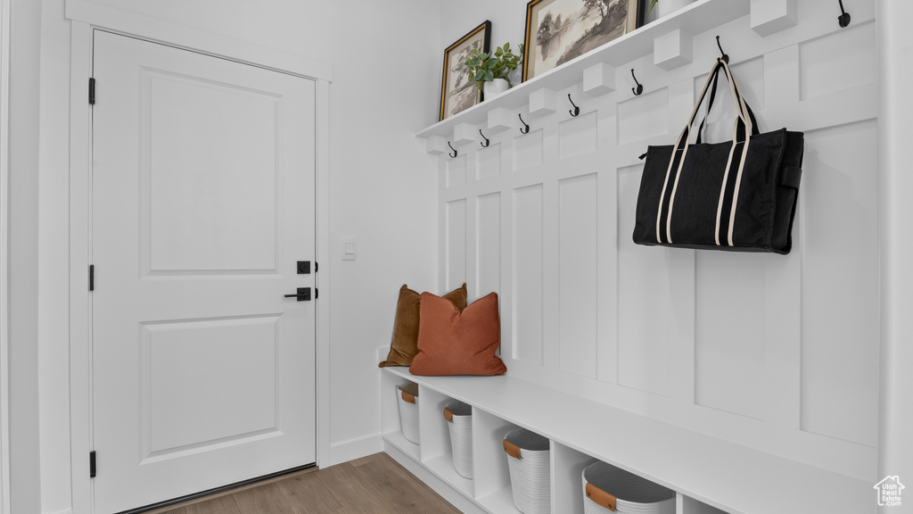 Mudroom with wood finished floors