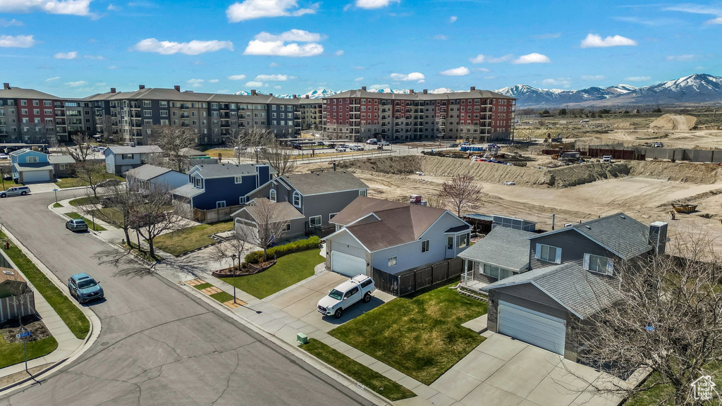 Birds eye view of property with a mountain view