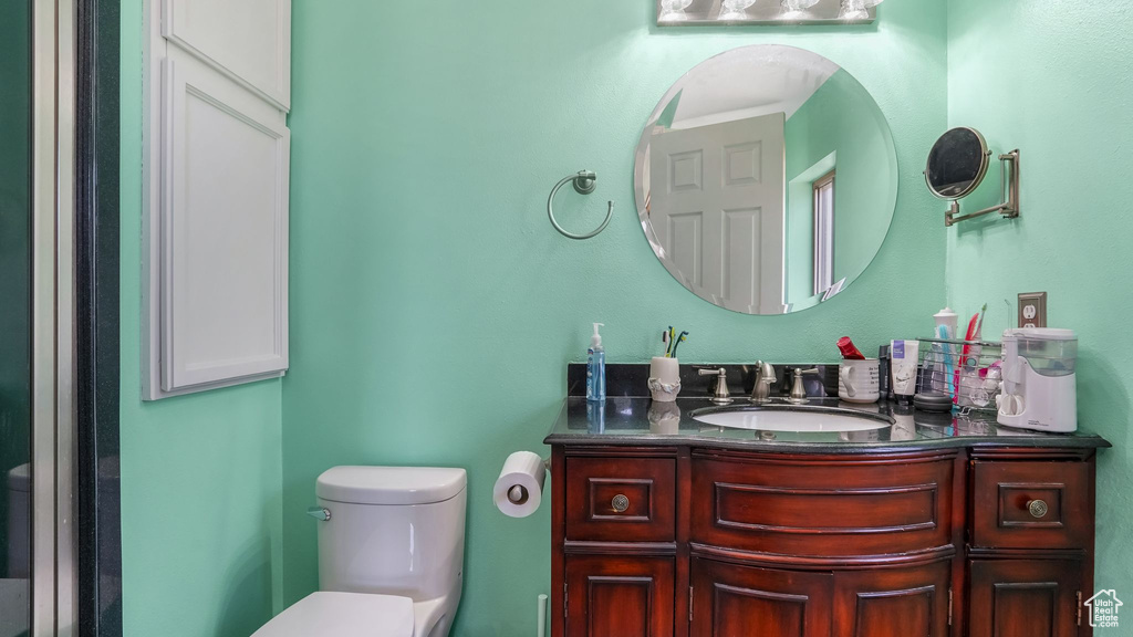 Bathroom featuring toilet and vanity