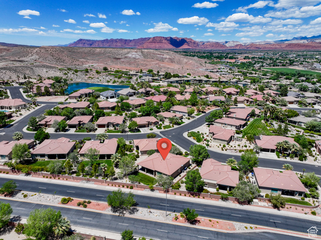Aerial view of residential area featuring a water and mountain view