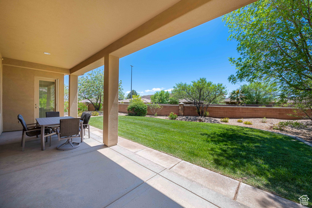 View of patio with outdoor dining space