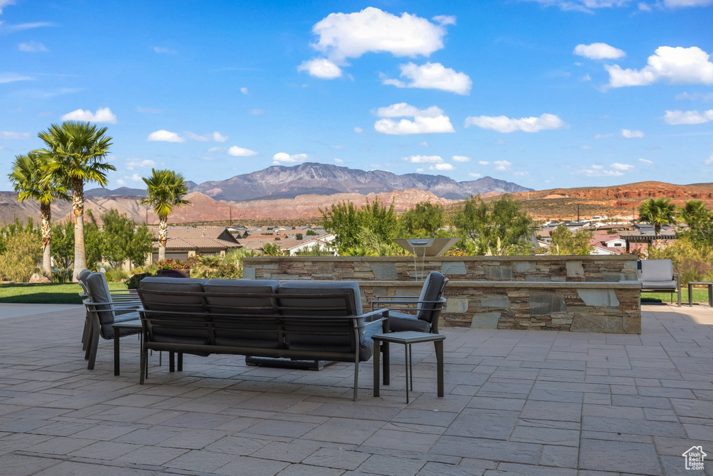View of patio / terrace featuring a mountain view and an outdoor hangout area