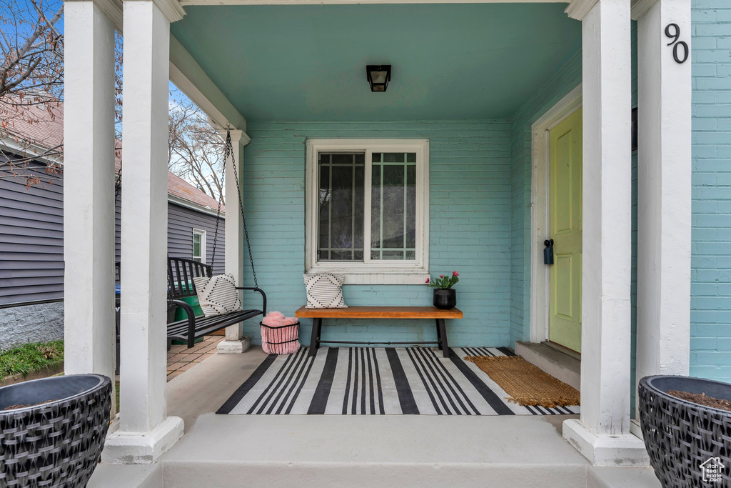 View of patio with covered porch
