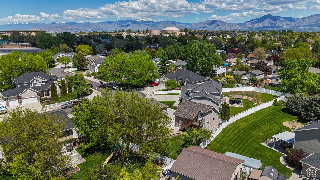 Aerial view of residential area with a mountain backdrop