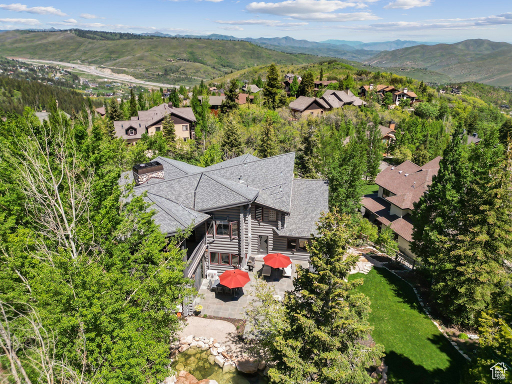 View from above of property with a mountainous background