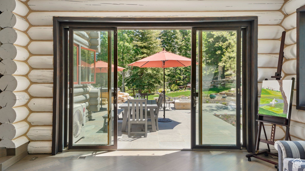 Doorway to outside with plenty of natural light
