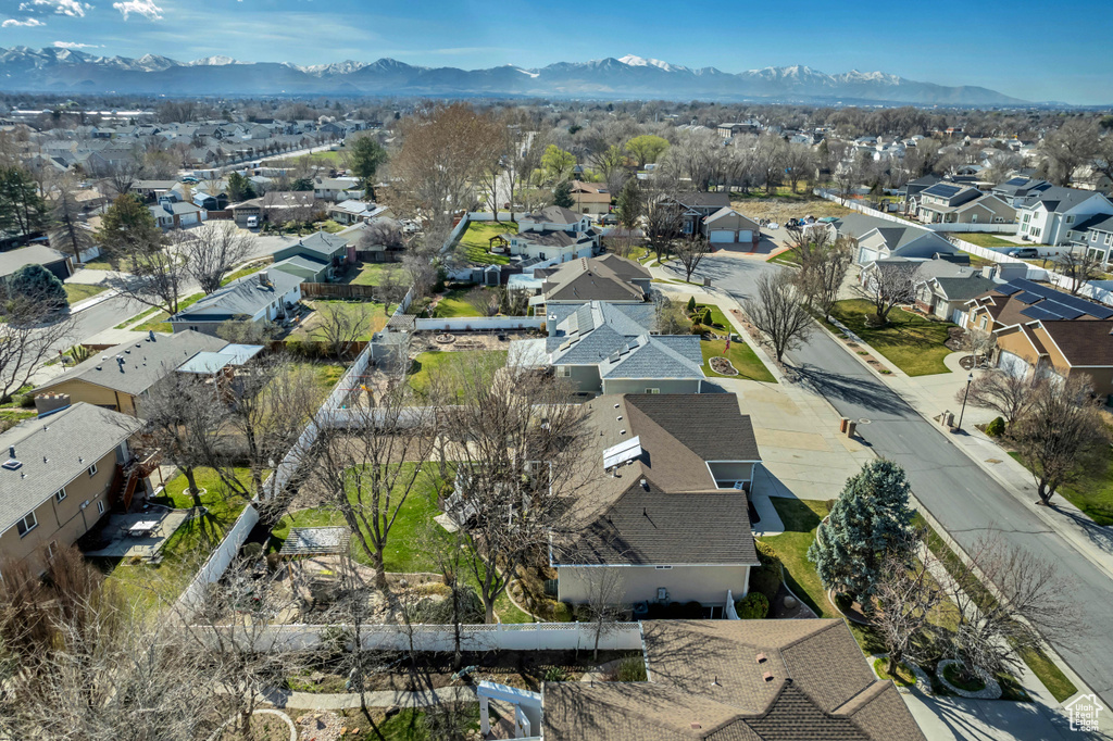 Drone / aerial view featuring a residential view and a mountain view