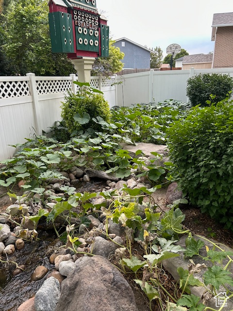 View of yard with fence